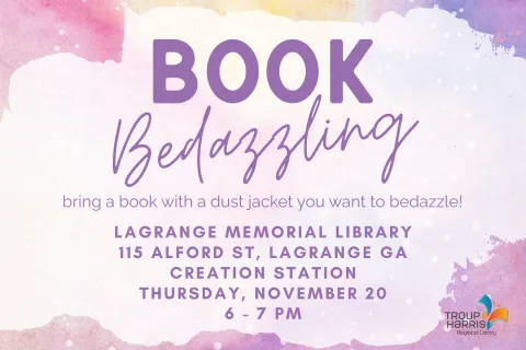 Flyer has a pink, yellow, and purple watercolor background with paint splatters. Text reads: Book Bedazzling - bring a book with a dust jacket you want to bedazzle! LaGrange Memorial Library. 115 Alford St, LaGrange GA. Creation Station. Thursday, November 20 from 6 - 7 pm"
